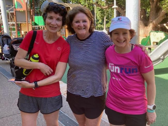 Bernadette Wallace (centre), pictured with close friends Kth and Cath, will clock up her 300th parkrun in Rockhampton this weekend.