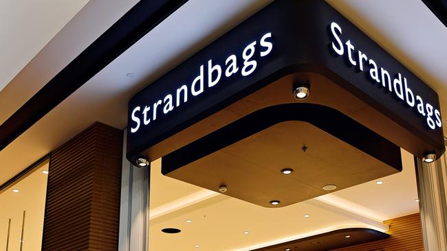 The man took close to $1000 worth of handbags from a Strandbags store.