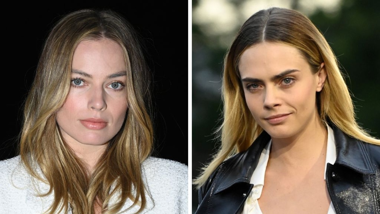 Margot Robbie visited Cara Delevingne. Pictures: Getty