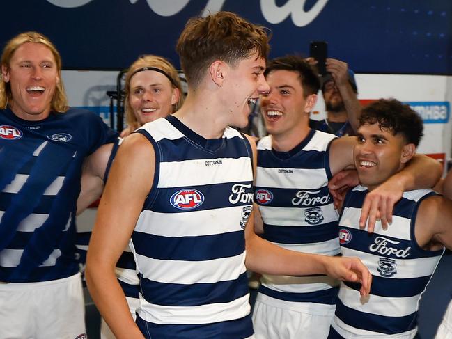 GEELONG, AUSTRALIA - APRIL 14: Debutant, Connor O'Sullivan of the Cats sings the team song during the 2024 AFL Round 05 match between the Geelong Cats and the North Melbourne Kangaroos at GMHBA Stadium on April 14, 2024 in Geelong, Australia. (Photo by Michael Willson/AFL Photos via Getty Images)