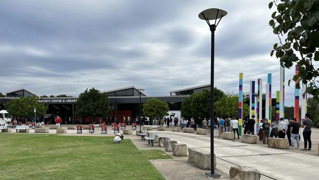 CARNES HILL, NSW - voters line up at the Carnes Hill community centre to cast their vote in the new electorate of Leppington. State election, March 2023.