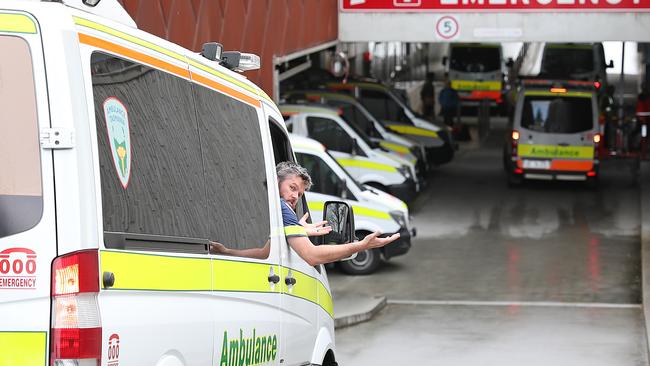 A paramedic wonders where he is going to park as ambulances are ramped outside the RHH on Tuesday afternoon. Picture: SAM ROSEWARNE