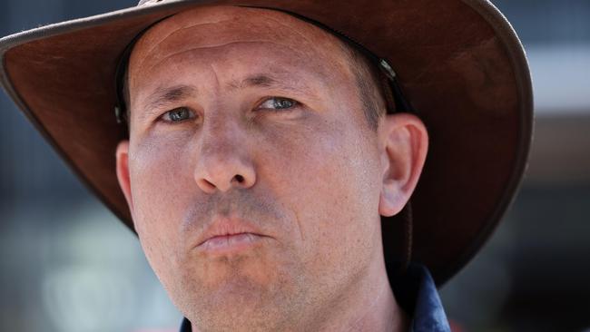 KatterÃs Australian Party candidate Ben Campbell gets questioned at Tjapukai pre poll in Cairns. Pics Adam Head