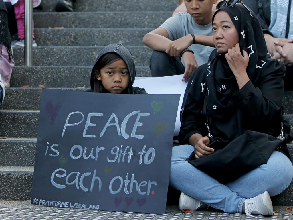 Messages of peace, love and support were displayed by attendees of Hobart's vigil for Christchurch at Franklin Square. Picture: PATRICK GEE