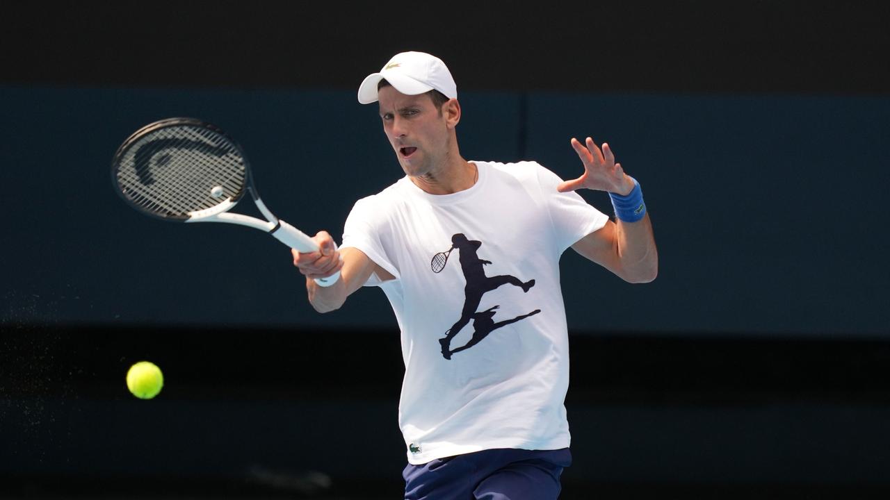 Novak Djokovic practices on centre court on Tuesday. Picture: Scott Barbour/Tennis Australia