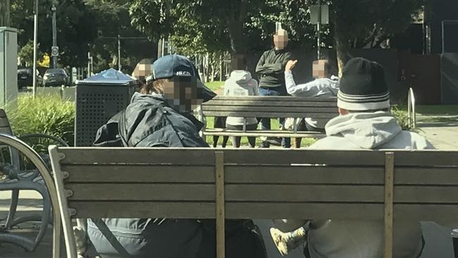 People enjoying coffee and stopping to chat at Beaumaris.