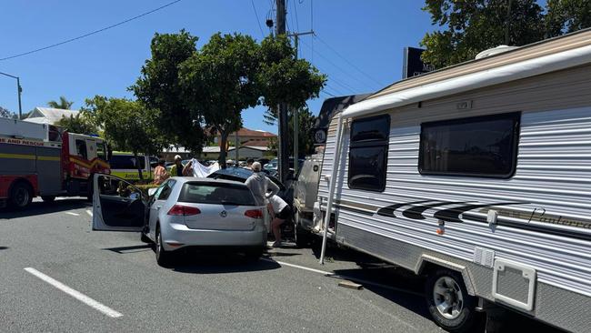 A ute towing a caravan was travelling north on Brisbane Road at Mooloolaba when it veered into oncoming traffic and struck five vehicles, including a parked car, which was pushed into a gardener who died.