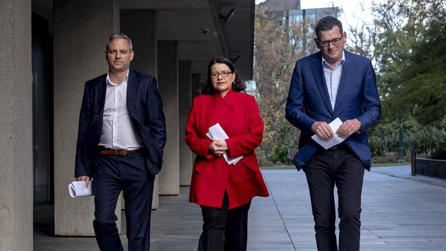 Victoria's CHO Brett Sutton, Minister for Health Jenny Mikakos and Premier Daniel Andrews arrive to a press conference