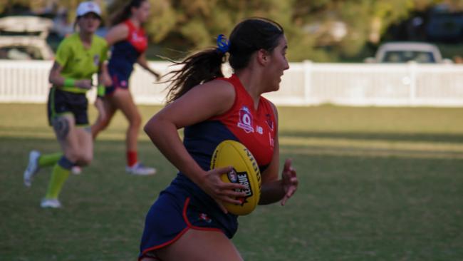 Mia Avatt on the move for the Surfers Paradise Demons.