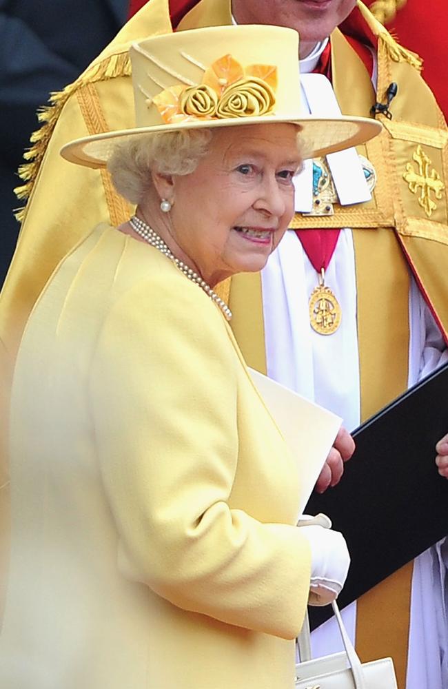 Hats are a must - just follow Queen Elizabeth II’s example. (Photo by Pascal Le Segretain/Getty Images)