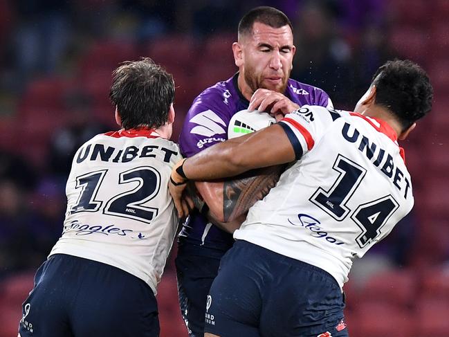 Faamausili, No 14, tackles Melbourne’s Nelson Asofa-Solomona in Round 8