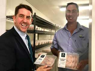 Minister for Manufacturing Cameron Dick with Brisbane Valley Protein project manager Peter McCarthy - and some of the product. Picture: Contributed