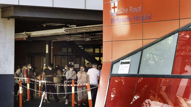 People queing at a coronavirus test at Royal Melbourne Hospital. Picture: Tony Gough