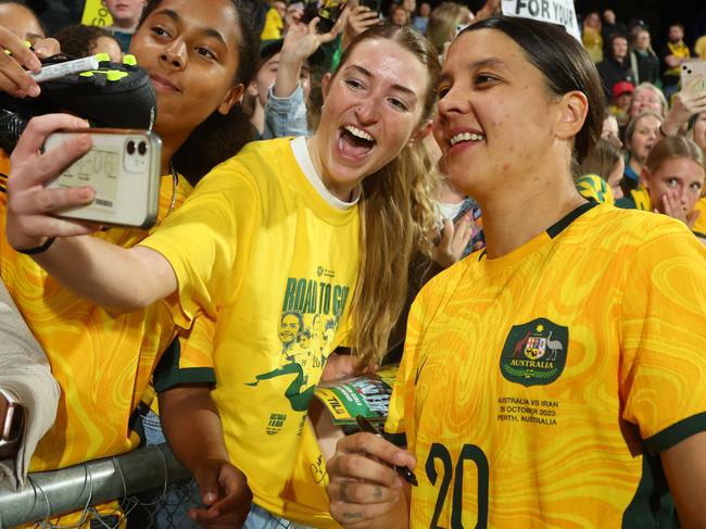 PERTH, AUSTRALIA - OCTOBER 26: Sam Kerr of the Matildas takes a selfie with fans after the win during the AFC Women's Asian Olympic Qualifier match between Australia Matildas and IR Iran at HBF Park on October 26, 2023 in Perth, Australia. (Photo by James Worsfold/Getty Images)