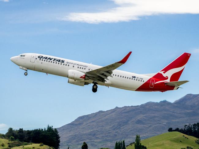 ESCAPE:  Queenstown, NEW ZEALAND - DEC 9, 2016: Airplane of Qantas Airways takes off from runway in Queenstown airport, Queenstown, South Island of New Zealand. Picture: Istock