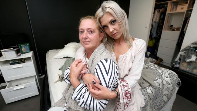 Karen Middleton and her daughter Reef Middleton at their Mermaid Waters home after they where victims of a home invasion. Picture Mike Batterham