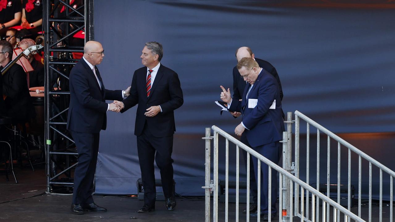 Peter Dutton greeted Defence Minister Richard Marles just a day after they clashed over Coalition plans to increase defence spending. Picture: Richard Dobson / Newswire