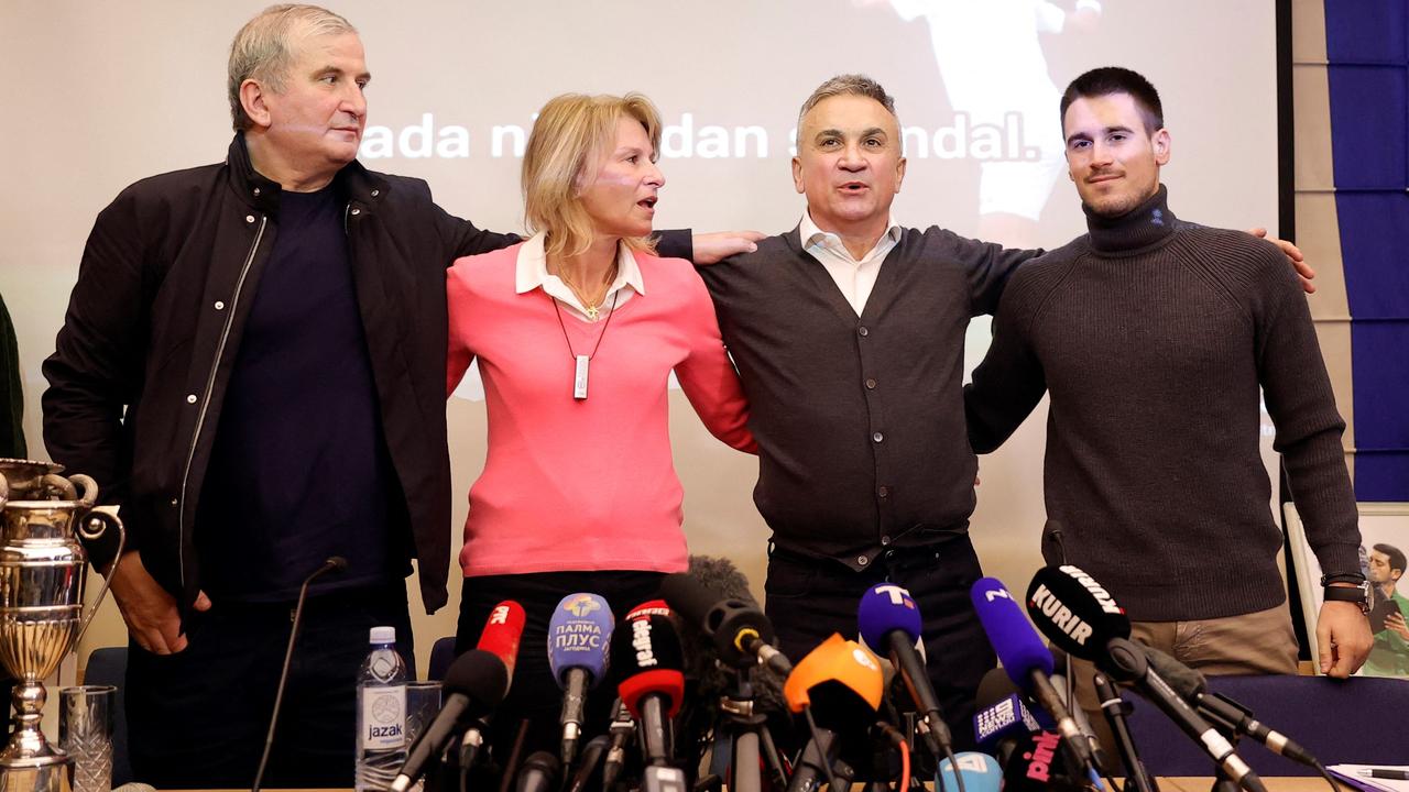 Relatives of Serbian tennis player Novak Djokovic (LtoR) his uncle Goran, his mother Dijana, his father Srdjan and his brother Djordje stand during a press conference, in Belgrade. Picture: Pedja MILOSAVLJEVIC / AFP