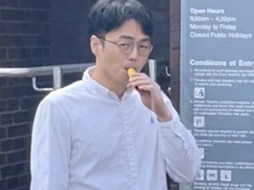 Sang Ill Lee vapes outside Hornsby Local Court.