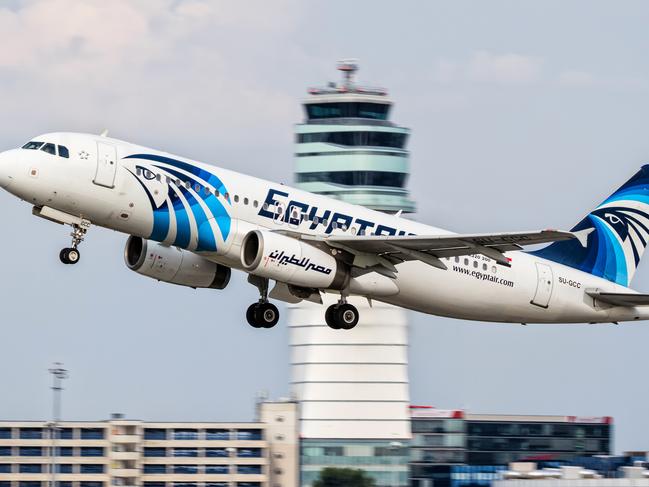 FILE -- This August 21, 2015 file photo shows an EgyptAir Airbus A320 with the registration SU-GCC taking off from Vienna International Airport, Austria. Egyptians officials say a bomb threat has forced an EgyptAir airliner en route to Beijing from Cairo to make an emergency landing in Uzbekistan, where the aircraft is being searched. (AP Photo/Thomas Ranner, File)