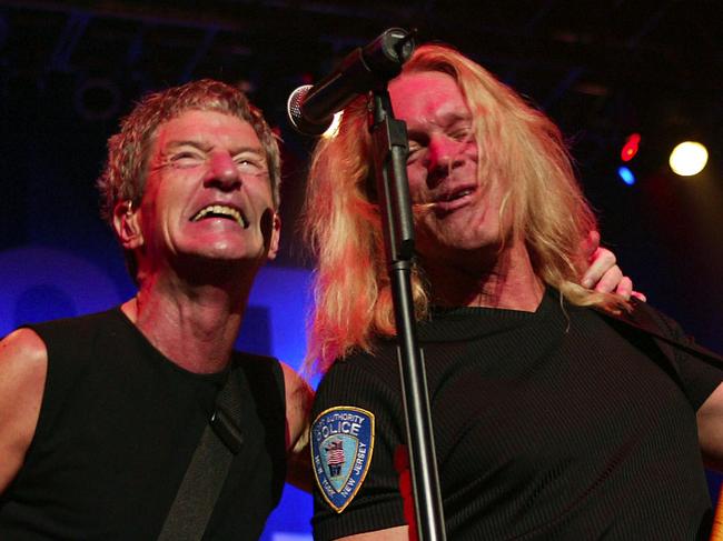 REO Speedwagon performs at the Rock To The Rescue Concert to benefit the victims of 9/11 and the Rock N' Roll Hall of Fame Children's Education Fund at the Gund Arena in Cleveland, Ohio. 10/20/02  Photo by Scott Gries/ImageDirect