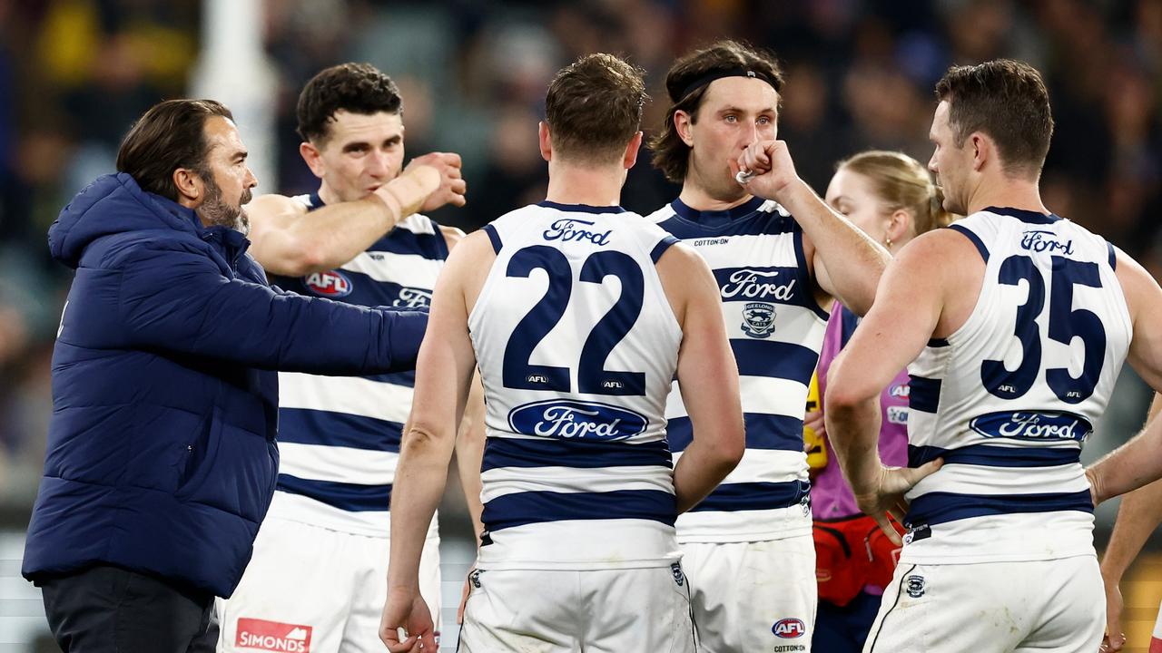 MELBOURNE, AUSTRALIA – JUNE 21: Chris Scott, Senior Coach of the Cats speaks with his players during the 2024 AFL Round 15 match between the Carlton Blues and the Geelong Cats at The Melbourne Cricket Ground on June 21, 2024 in Melbourne, Australia. (Photo by Michael Willson/AFL Photos via Getty Images)