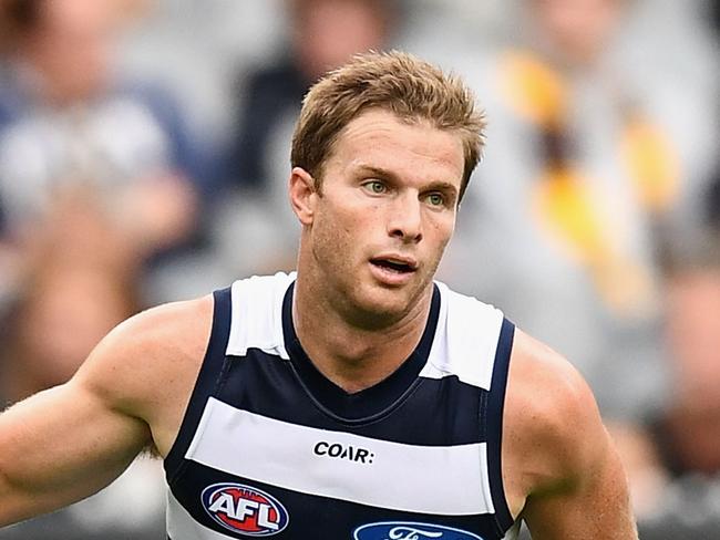 MELBOURNE, AUSTRALIA - APRIL 17:  Lachie Henderson of the Cats celebrates kicking a goal during the round four AFL match between the Hawthorn Hawks and the Geelong Cats at Melbourne Cricket Ground on April 17, 2017 in Melbourne, Australia.  (Photo by Quinn Rooney/Getty Images)