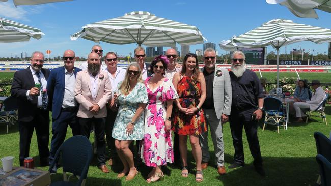 Katie, Matty, Russ, Wayne, Katie, Tom, Ronny, Debby, Jeff, Wayne and David at the 2024 Crown Oaks Day, held at Flemington Racecourse. Picture: Gemma Scerri