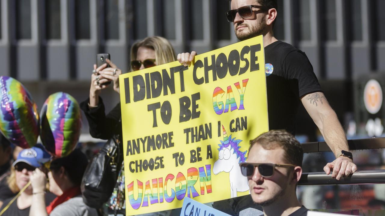 Protesters gather in support of efforts to legalise same sex marriage at Sydney Town Hall on August 6, 2017. (Photo by Brook Mitchell/Getty Images)