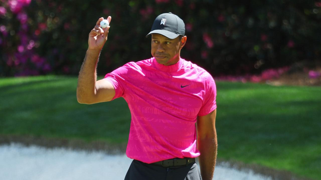 Tiger Woods does what mere mortals can’t. (Photo by Andrew Redington/Getty Images)