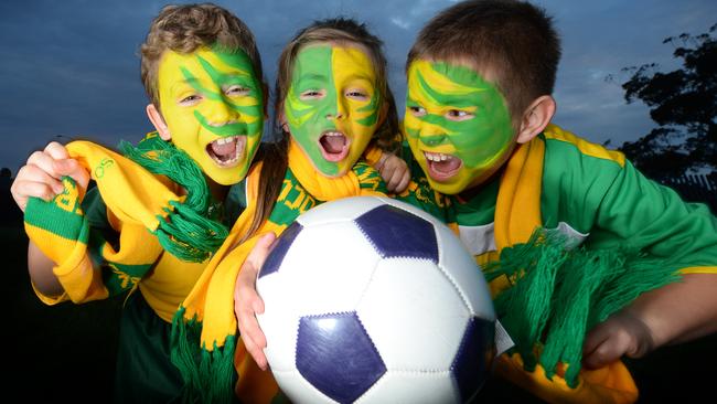 Eva Kokotis (centre) supporting the Socceroos in 2013.