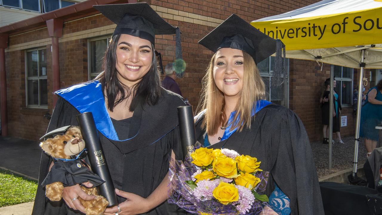 Indira Jorgensen (Bachelor of Paramedicine) and Ebony Green (Bachelor of Nursing) at the USQ graduation on Wednesday, April 14, 2021. Picture: Nev Madsen.