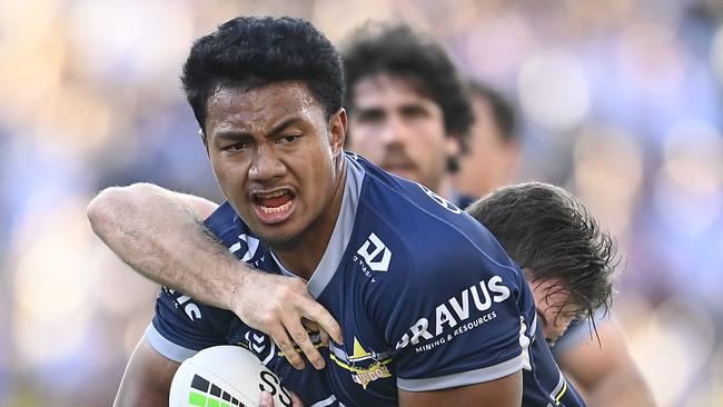 TOWNSVILLE, AUSTRALIA - JULY 17: Peter Hola of the Cowboys is tackled during the round 18 NRL match between the North Queensland Cowboys and the Sydney Roosters at QCB Stadium, on July 17, 2021, in Townsville, Australia. (Photo by Ian Hitchcock/Getty Images)