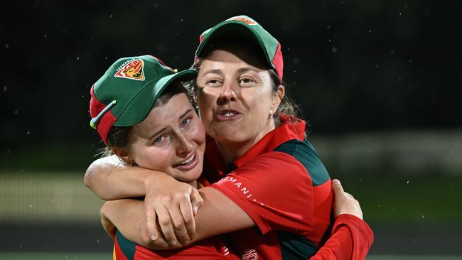 Amy Smith (left) and Molly Strano (right) celebrate the Tigers last-over one run win in the 2022-23 WNCL grand final over South Australia. (Photo by Steve Bell/Getty Images)