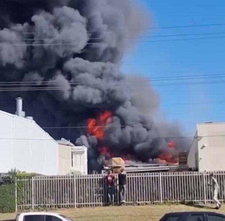 Firefighters rush to Moorebank Industrial Complex after reports of fire