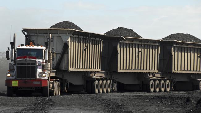 A large truck hauling coal. How much longer will coal be part of our energy future?