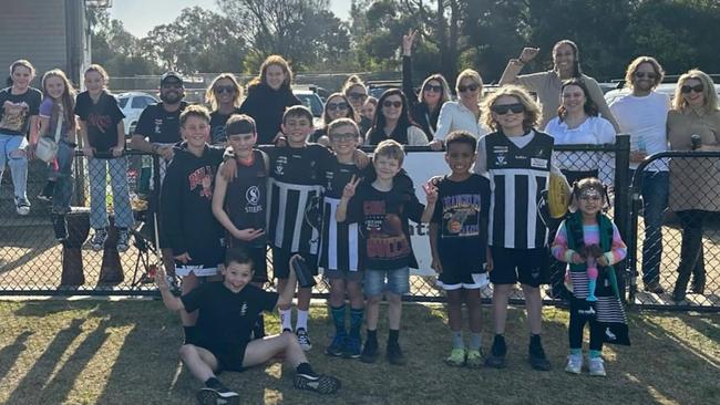 Geva Mentor (back row, third from right) at Crib Point's match last Saturday. Pic: Facebook