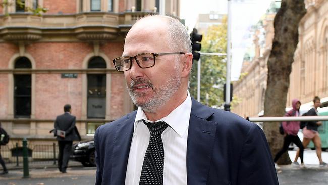 Chris Kenny arrives at the memorial service for Bill Leak, at Town Hall in Sydney, Friday, March 17, 2017. Leak was an editorial cartoonist and artist at The Australian newspaper, and passed away last week aged 61from a suspected heart attack. (AAP Image/Dan Himbrechts) NO ARCHIVING