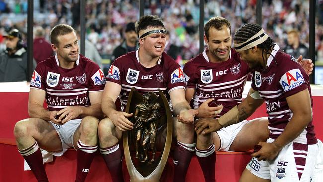 (L-R) Michael Robertson, Jamie Lyon, Brett Stewart and Steve Matai celebrate after winning the 2011 NRL Grand Final. Picture: Getty Images.