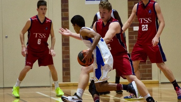 TSS Basketball captain Jack Brinsmead challenges a Nudgee player. Picture supplied.