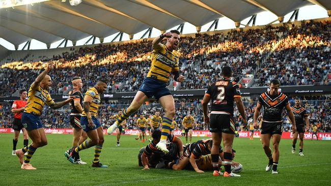 Clint Gutherson celebrates Brad Takairangi’s try at the sold-out opening of Bankwest Stadium back in April. Picture: AAP