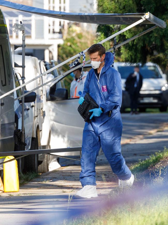 Forensic police at the Blue Mountains home on Wednesday morning. Picture: Max Mason-Hubers