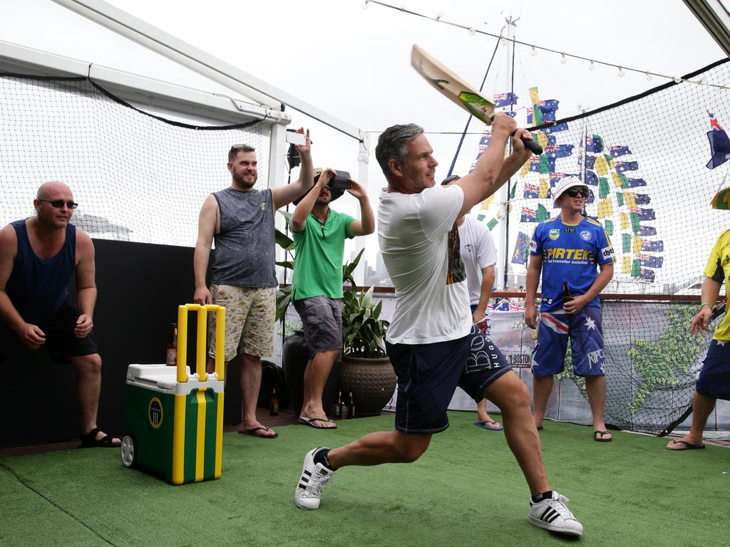 Brad Hodge having a bat during a game of backyard cricket at the Triple M Australia One-Dayer held on "the island" in Sydney Harbour. Picture: Jonathan Ng