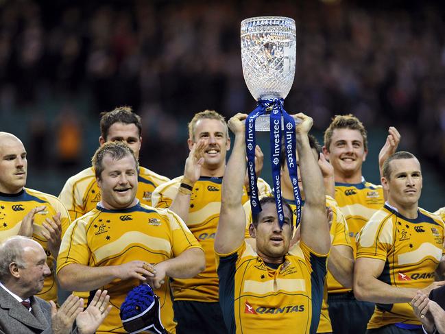 Former Australian captain Rocky Elsom lifts the Cook Cup after they beat England 9-18 in a match against England at Twickenham Stadium in 2009. Picture: Adrian Dennis