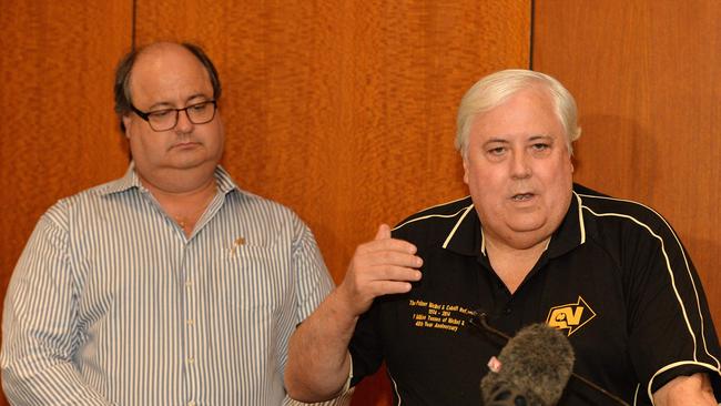 Clive Mensink and his uncle Clive Palmer pictured in a file photo from 2015 speaking to media about QN.