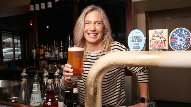 Kristie Johnston behind the bar. Maypole Hotel in New Town with new owners including Independent member for Clark Kristie Johnston. Picture: Nikki Davis-Jones