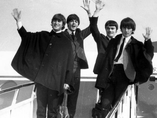 Beatles pop band arriving in Australia for tour. (L-R) John Lennon with Paul McCartney, Jimmy Nicol and George Harrison 1964.
