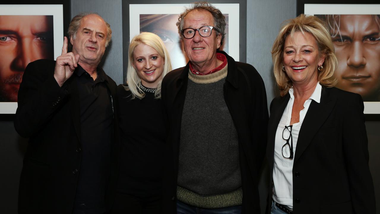 Michael Gudinski, left, with daughter Kate and wife Sue, and actor Geoffrey Rush. Picture: Julie Kiriacoudis