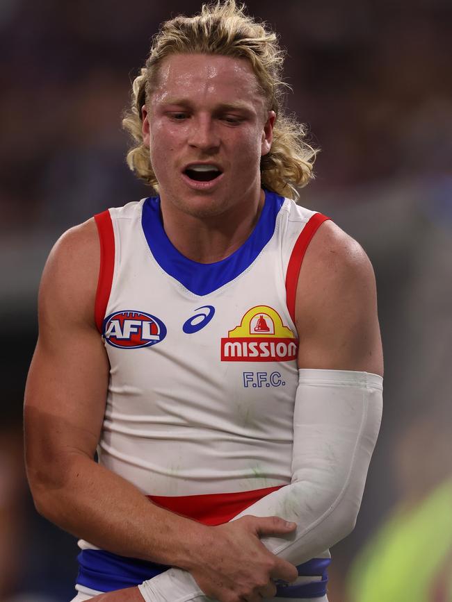 Cody Weightman heads off with an elbow injury. Picture: Paul Kane/Getty Images