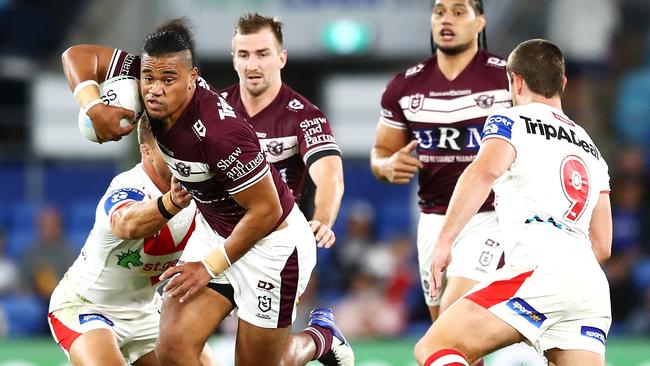 Moses Suli of the Sea Eagles makes a break during the round 18 NRL match between the Manly Sea Eagles and the St George Illawarra Dragons at Cbus Super Stadium, on July 16, 2021, in Gold Coast, Australia. (Photo by Chris Hyde/Getty Images)